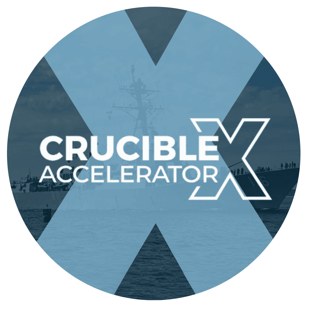 Crucible Accelerator logo with navy ship and water background.